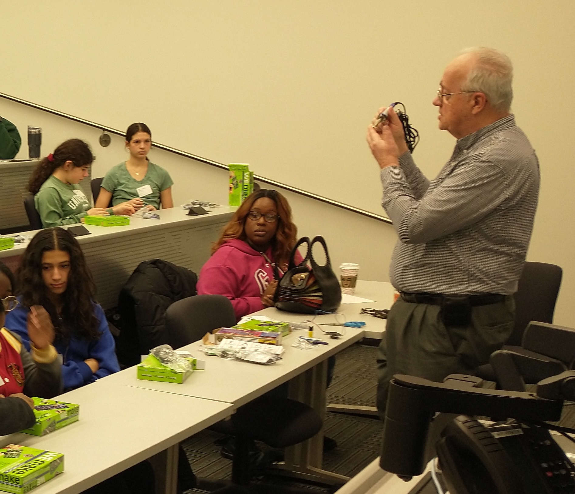 Steve Peters, SMIEEE, Northwest Subsection Chair, demonstrates to the students how to use a soldering iron.