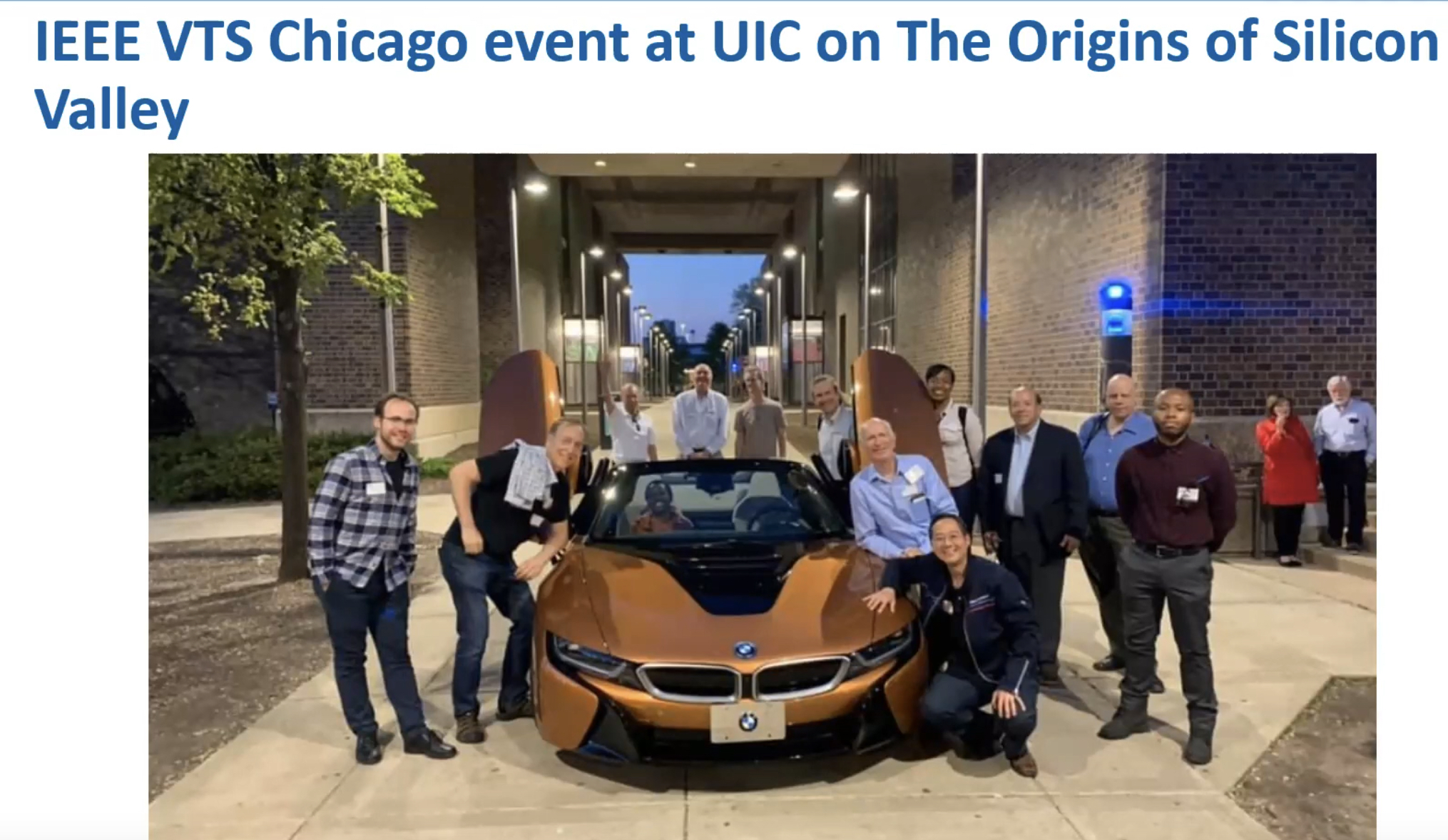 IEEE-chicago-4 VTS Event at UIC. Members standing around a gold BMW
